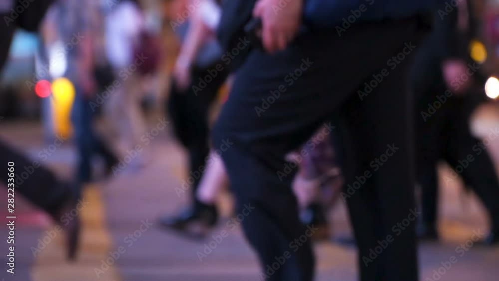 People crossing a busy city intersection. Hong Kong, Crosswalk, Night, Crossing, Slow Motion People crossing a busy city intersection. Hong Kong, Crosswalk, Night, Crossing, Slow Motion