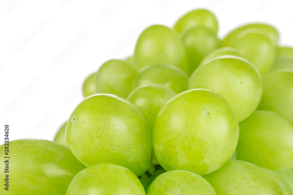 Lot of whole fresh green grape in closeup isolated on white background Lot of whole fresh green grape in closeup isolated on white background