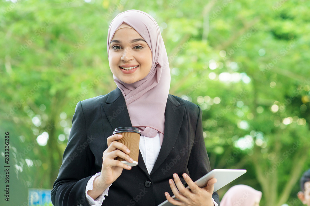 Muslim business woman going to work