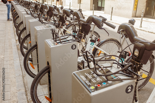 Row of city bicycles in Madrid, Spain