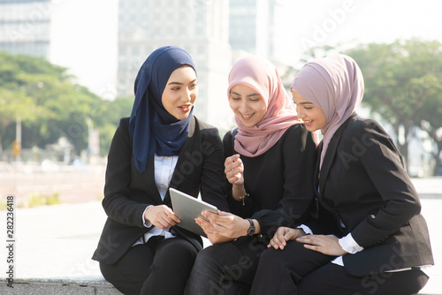 Muslim business women discussing