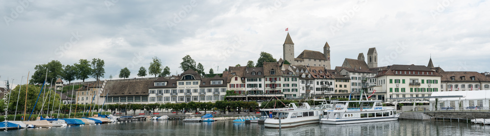 harbor and city of Rapperswil with the historic castle and church panorama