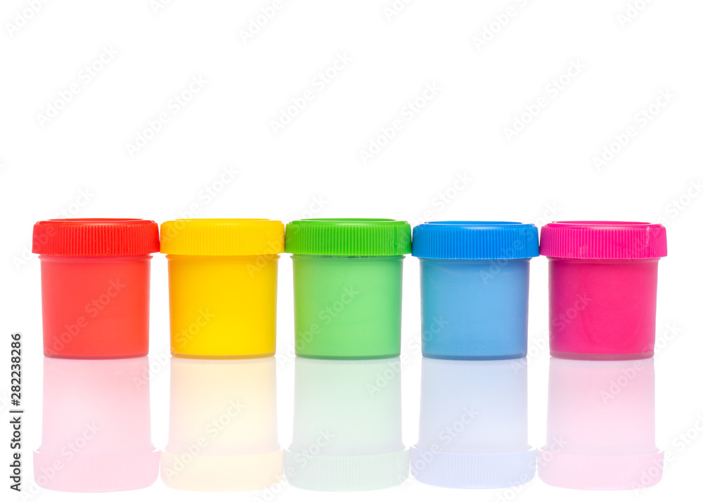 Set of Colorful Gouache jars isolated on white background with copy space. Cans of different colors gouache paints. Set of Colorful Gouache jars isolated on white background with copy space. Cans of different colors gouache paints.