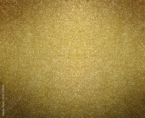 Gold background. Golden glitter or shimmer texture