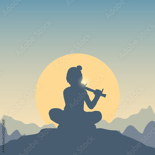 Background for celebration of Happy Janmashtami festival of India. Lord Krishna playing the flute at the top of a hill. Vector flat card, banner with silhouette of boy and mountain landscape, sun.