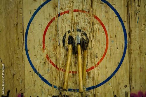 Axe stick on the bullseye target in Throwing axe new trend sport