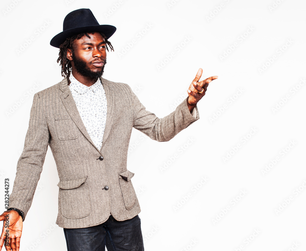young handsome afro american boy in stylish hipster hat gesturing emotional isolated on white background smiling, lifestyle people concept close up young handsome afro american boy in stylish hipster hat gesturing emotional isolated on white background smiling, lifestyle people concept close up