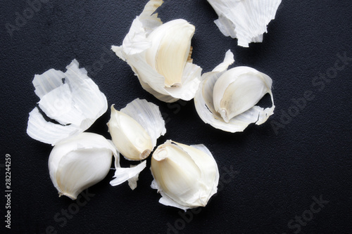 garlic on a black board close up