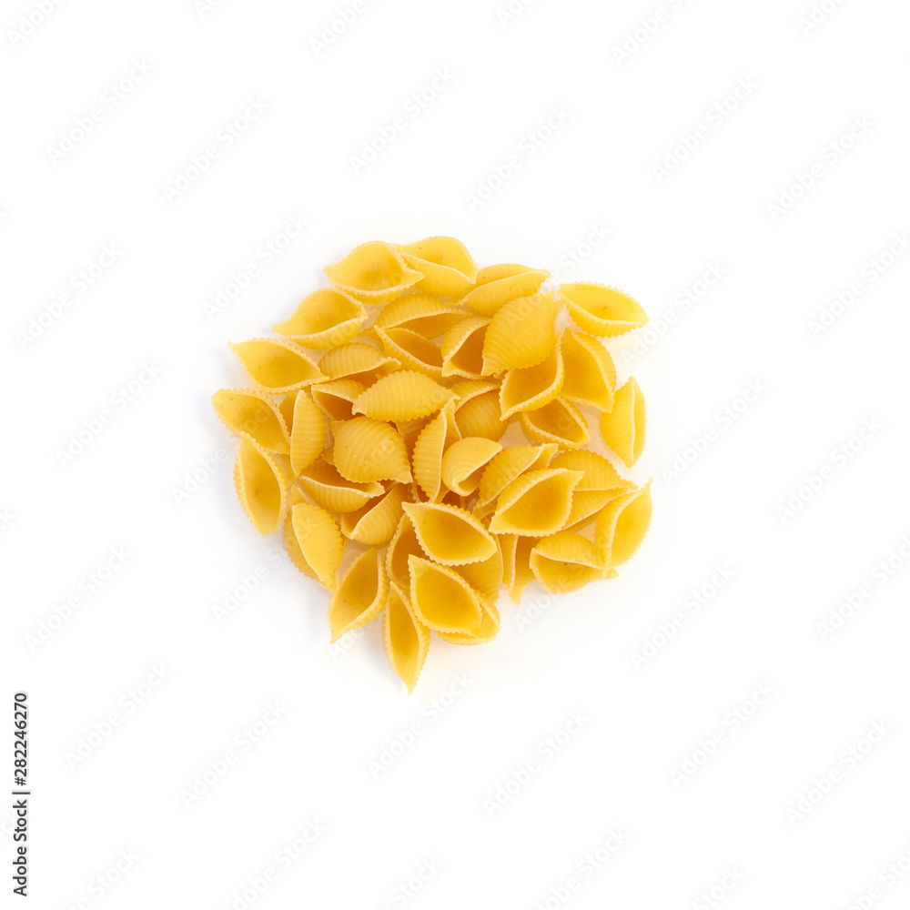 Raw pasta conchigliette isolated over white background Raw pasta conchigliette isolated over white background