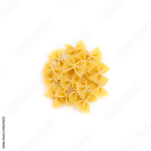 Raw pasta pipe farfalle isolated over white background