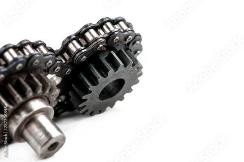 Driving roller chain and gear isolated on white background.Copy space