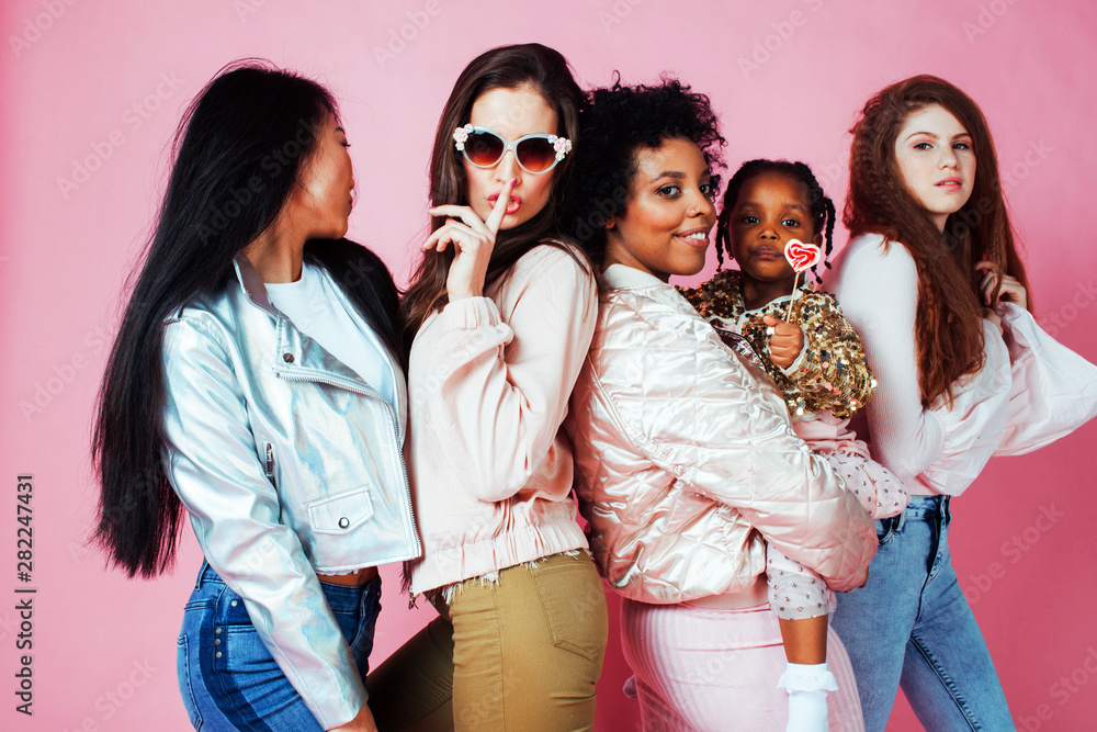 different nation girls with diversuty in skin, hair. Asian, scandinavian, african american cheerful emotional posing on pink background, woman day celebration, lifestyle people concept different nation girls with diversuty in skin, hair. Asian, scandinavian, african american cheerful emotional posing on pink background, woman day celebration, lifestyle people concept