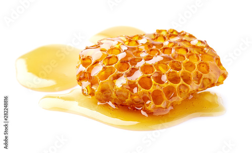 Tablou canvas Natural wild honey on white background
