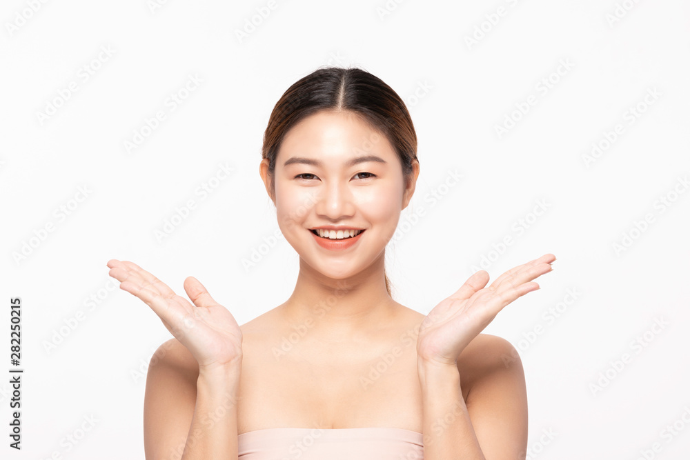Beautiful Attractive Charming Asian young woman smile with white teeth open hand palm for display cosmetics product cheerful with healthy skin,isolated on white background,Beauty Cosmetology Concept Beautiful Attractive Charming Asian young woman smile with white teeth open hand palm for display cosmetics product cheerful with healthy skin,isolated on white background,Beauty Cosmetology Concept