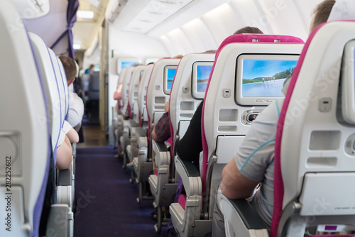 View of Passenger Aisle Seats inside Airplane