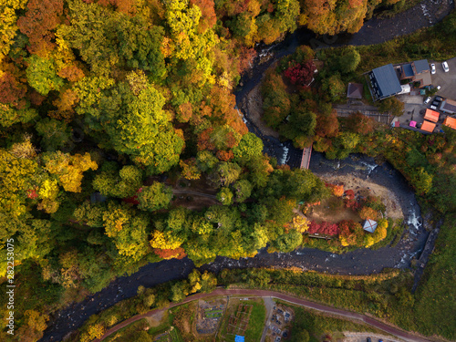 Aerial of autumn leaves at Nakano Momiji mountain, tourist attraction , Kuroishi, Aomori, Japan (Photo from drone)