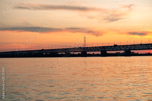 Bridge over the Amur river at sunset. Russia. Khabarovsk. Photo from the middle of the river. © rdv27
