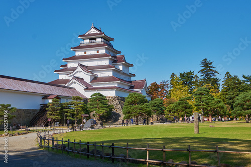 Vibrant autumn colors (foliage) at Aizu-Wakamatsu castle or Tsuruga castle, Aizu, Fukushima Prefecture, Japan photo