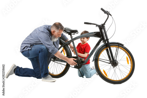 Cute little boy with grandf...