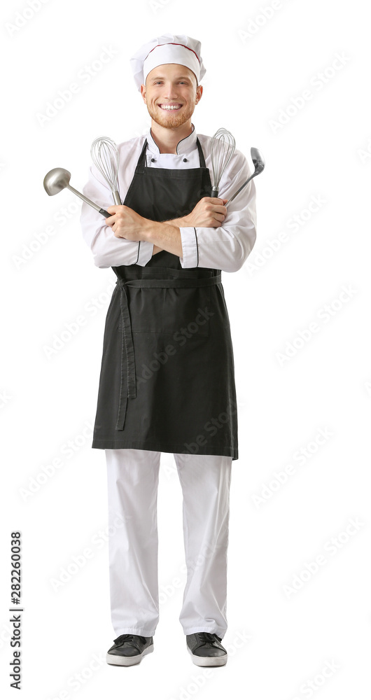 Handsome male chef with kitchenware on white background Handsome male chef with kitchenware on white background