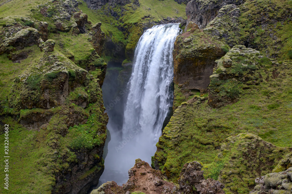 Waterfalls in the fog on the Skoda river. Iceland