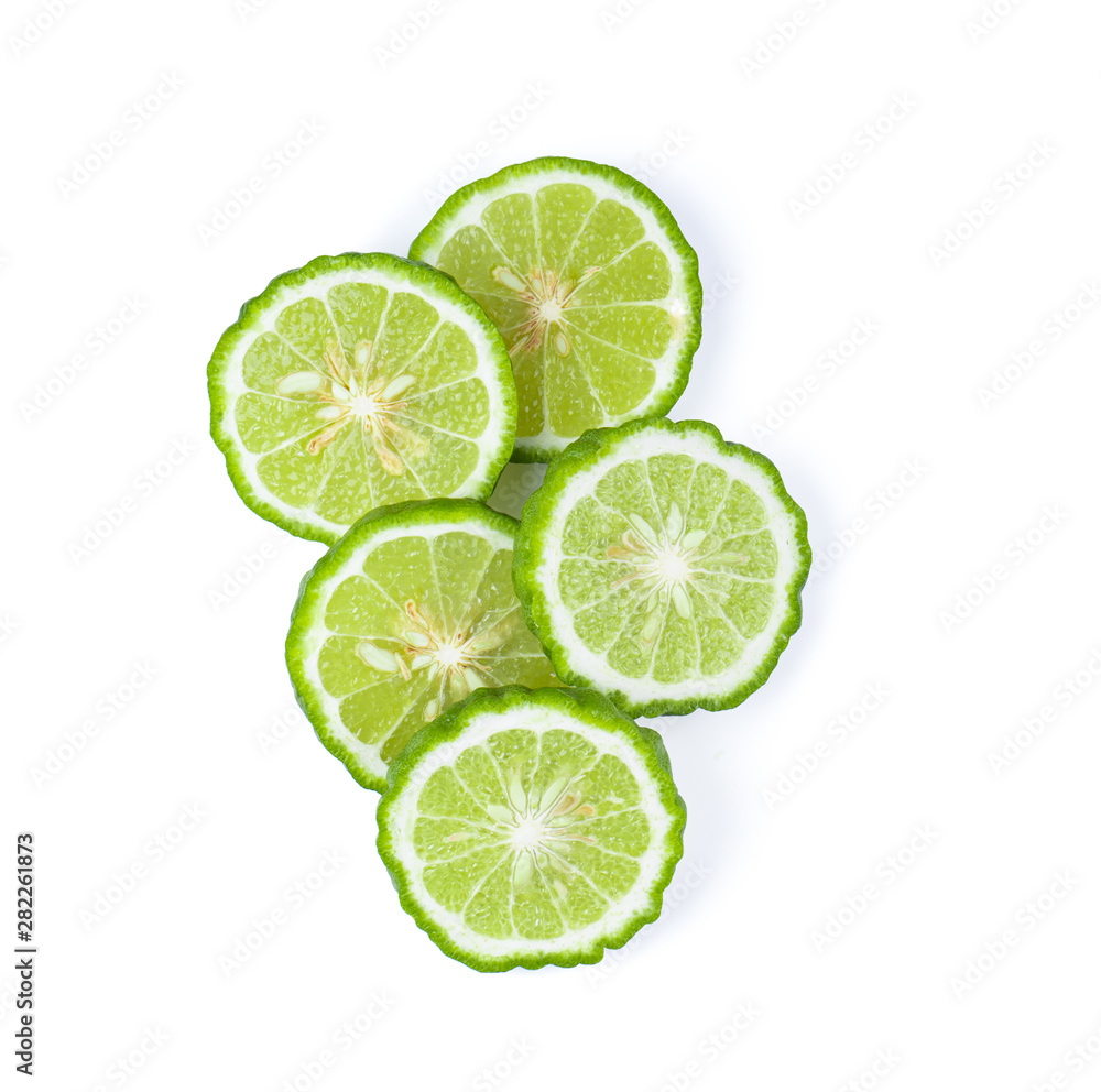 slice of bergamot or kaffir with seeds isolated on white background.
