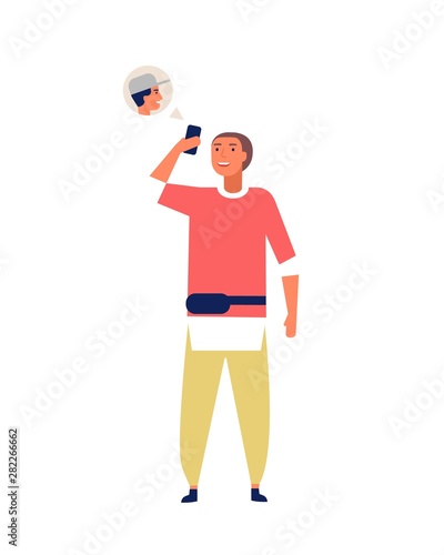 Teenage boy video chatting with friend via smartphone