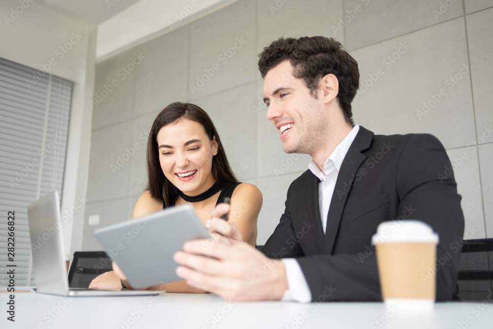 Smiling and Laughing with working.