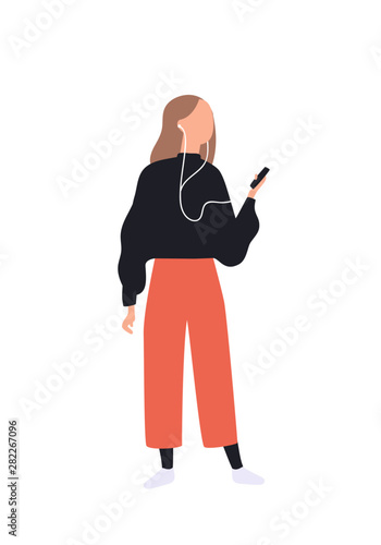 Cute girl listening to music via smartphone