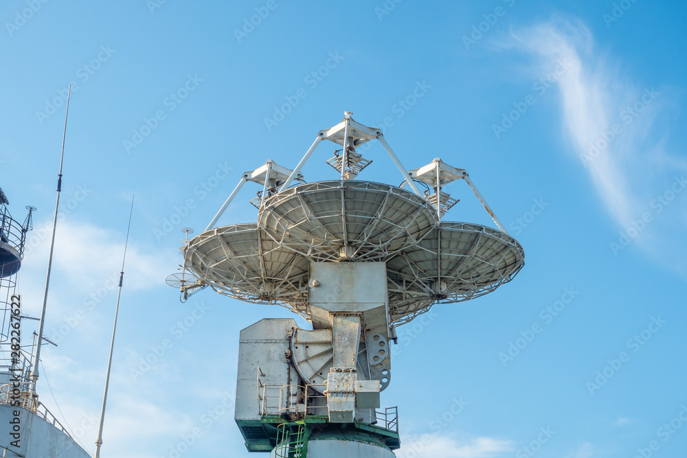 Antennas for communication with spacecraft. Satellite sea vessel with satellite dish.