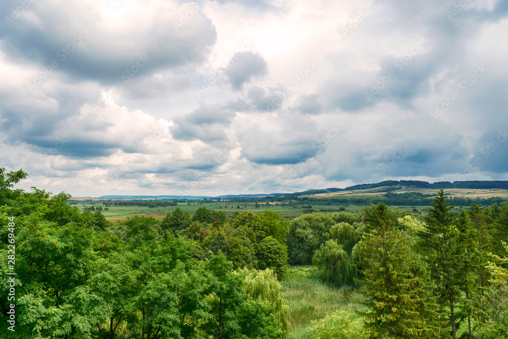 Fototapeta premium Landscape with beautiful cloudy sky and nature. Nature.
