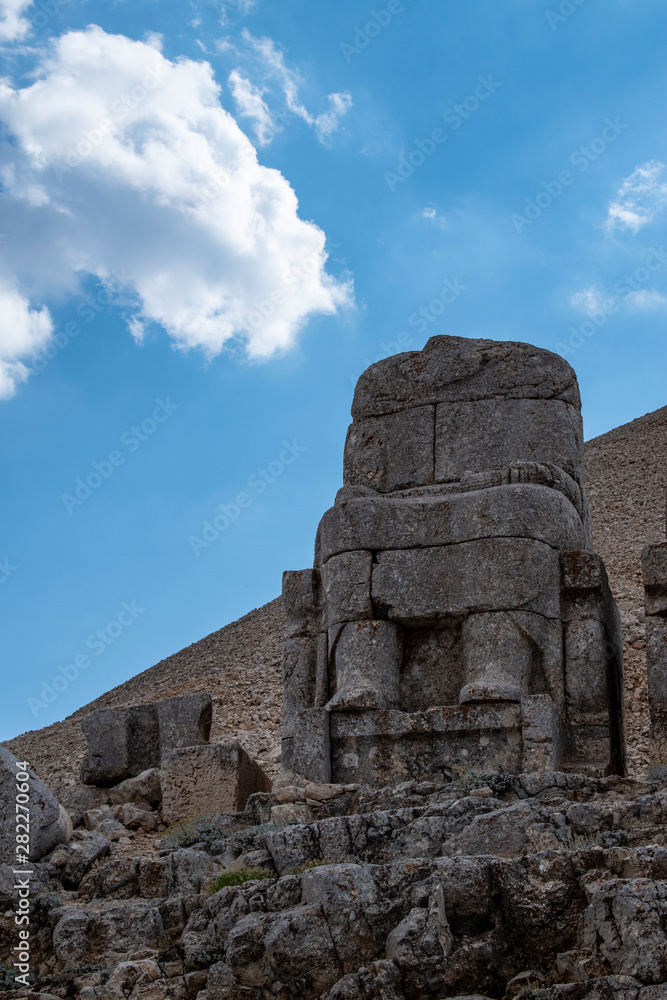 Turkey: the east terrace of Nemrut Dagi, Mount Nemrut, where in 62 BCE King Antiochus I Theos of Commagene built a tomb-sanctuary flanked by huge statues of himself and Greek, Armenian and Median gods Turkey: the east terrace of Nemrut Dagi, Mount Nemrut, where in 62 BCE King Antiochus I Theos of Commagene built a tomb-sanctuary flanked by huge statues of himself and Greek, Armenian and Median gods