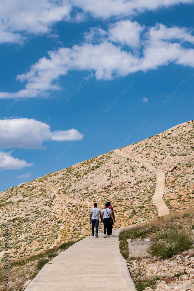 Turkey: footpath to Nemrut Dagi, Mount Nemrut, on whose summit in 62 BCE King Antiochus I Theos of Commagene built a tomb-sanctuary flanked by huge statues of him and Greek, Armenian and Median gods