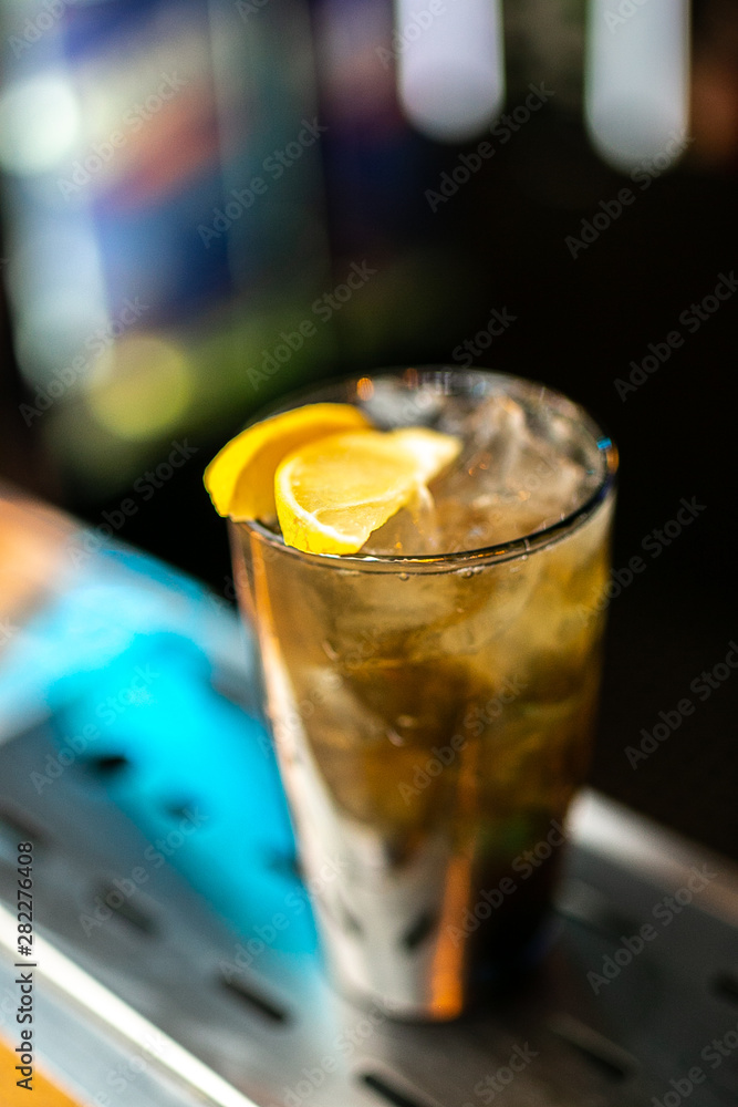 Cocktail on the bar blurred background Cocktail on the bar blurred background