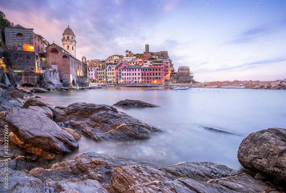 Sunrise from the port of Vernazza. Vernazza is one of the five towns that make up the Cinque Terre region. It is the only natural port of Cinque Terre and is famous for its elegant houses.