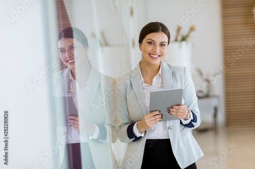 Young woman with a tablet i...