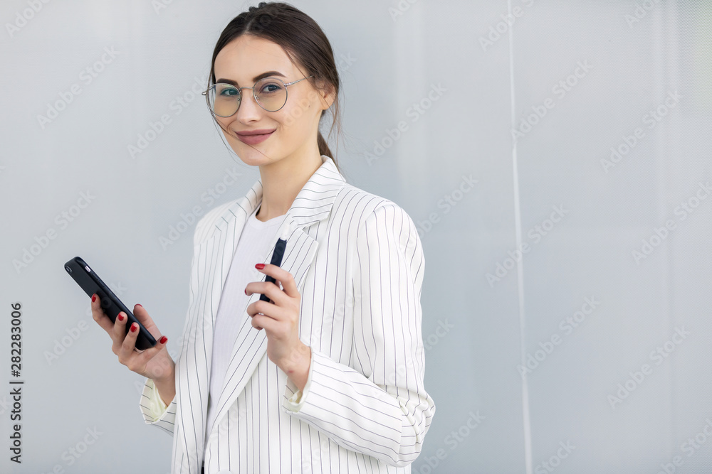 Business Woman Using Phone Near Office Business Woman Using Phone Near Office