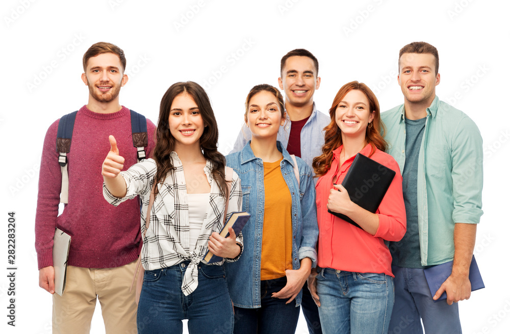 education, high school and people concept - group of smiling students with books showing thumbs up over white background education, high school and people concept - group of smiling students with books showing thumbs up over white background