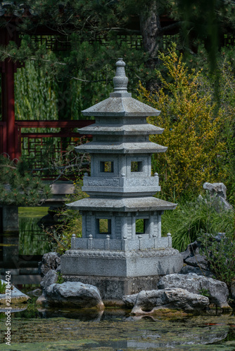 Pagoda garden statue at a lake