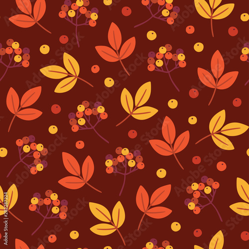 Seamless pattern with autumn foliage and rowen berry. Flat vector illustration.