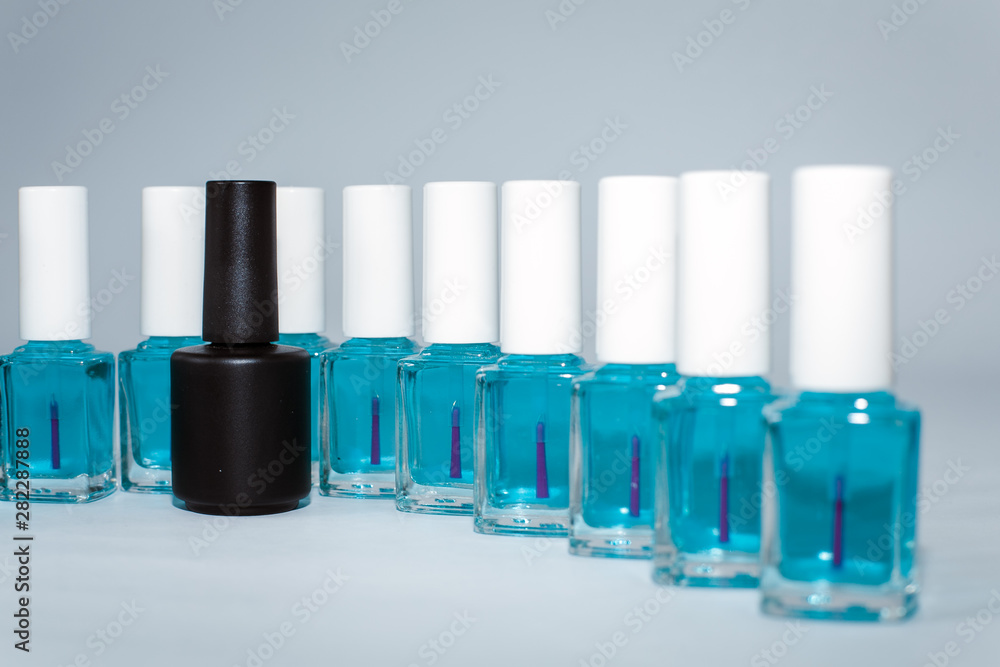 nail polishes on a white background in different compositions nail polishes on a white background in different compositions