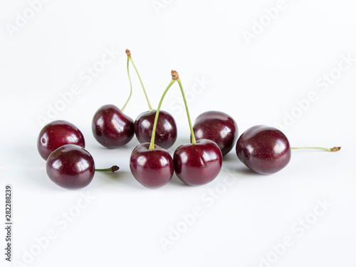 sweet fresh ripe sweet cherries on a white background