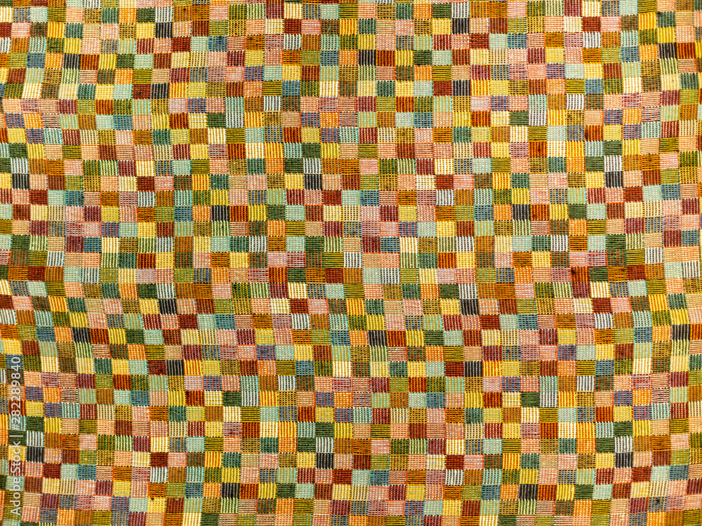 Fototapeta premium Colorful patchwork fabric paterrn background texture