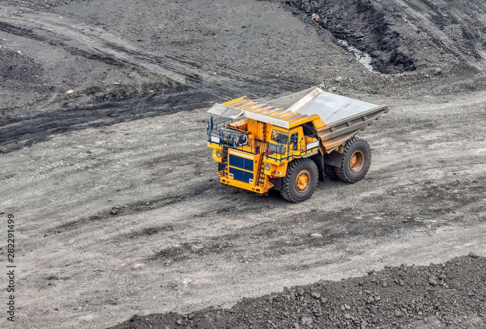 Large quarry dump truck. Transport industry. Large quarry dump truck. Transport industry.