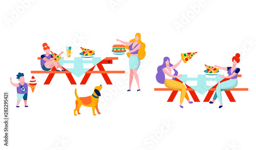 People Eating Out in Public Place Sitting at Table