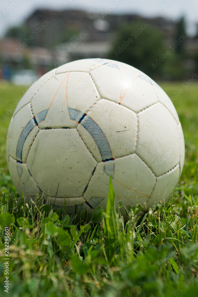 Fototapeta premium lonely soccer ball in an empty field before training