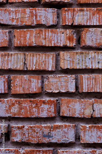 Old red brick wall, rustic texture, design vertical background.
