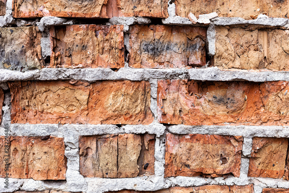 Old red brick wall, rustic, shattered texture, design background. Old red brick wall, rustic, shattered texture, design background.