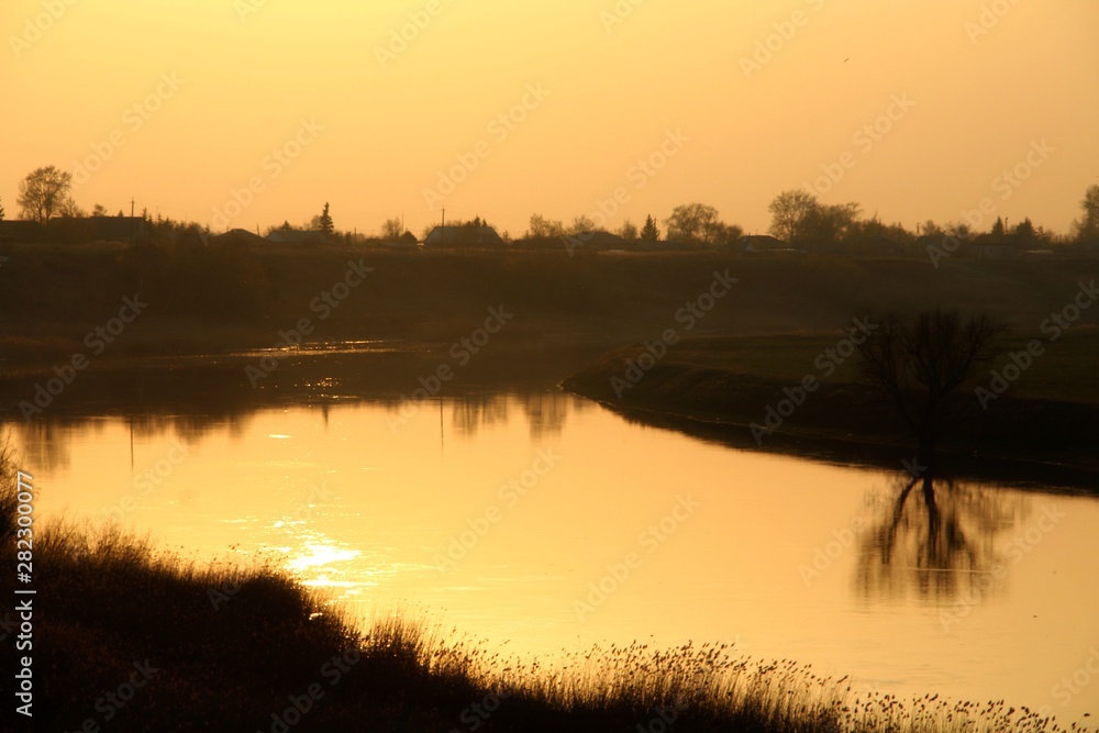 Fototapeta premium sunset over lake