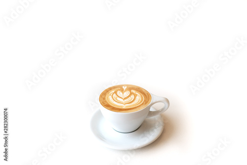 фотографія A cup of latte or capuchino in a white cup on white surface